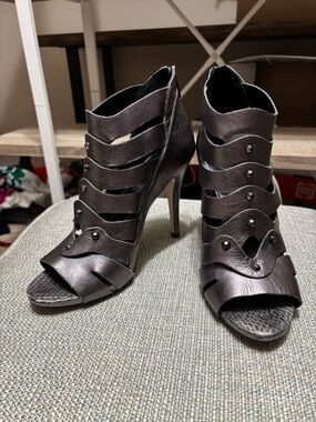 Stunning silver bootie with 4” stiletto heel by White House Black Market, size 9